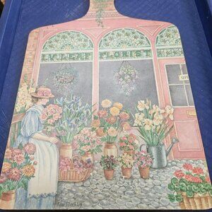 vintage wilscombe melamine cutting board featuring a florist scene